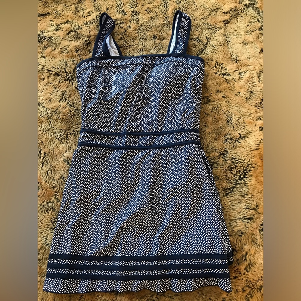 Retro style one-piece bathing suit in Navy and White polka dots, gently used